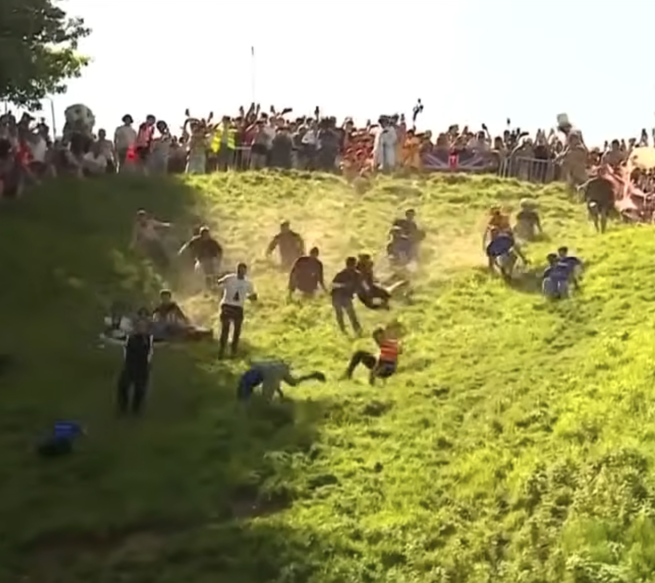 German YouTuber Beats World Record-Holder in Chaotic Cheese Rolling Race | The Independent